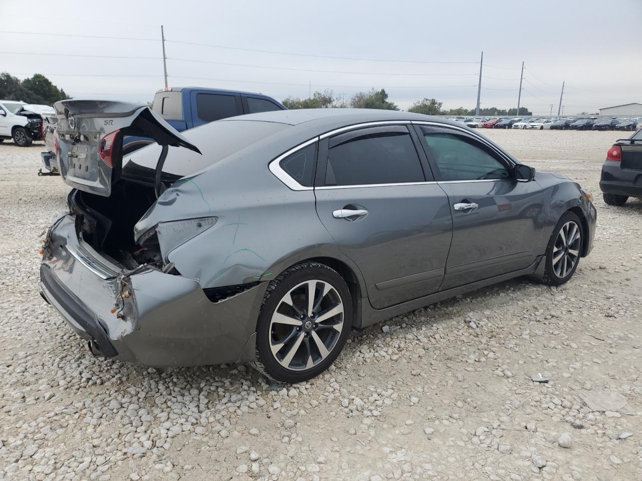 2017 Nissan Altima VIN 1N4AL3AP7HC122251 Copart auction photo, rear end / all over damage thumbnail 3