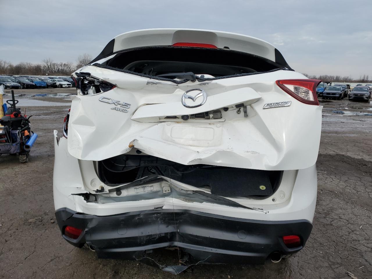 2016 Mazda CX-5 VIN JM3KE4CY7G0821701 Copart auction photo, rear end damage thumbnail 6