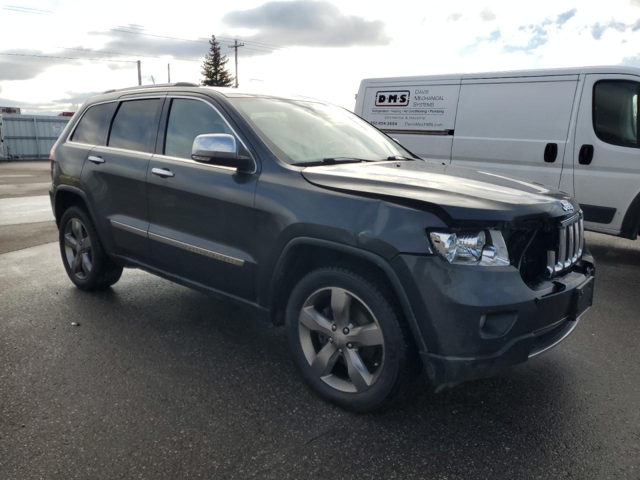 2011 Jeep Grand Cherokee VIN 1J4RR5GG1BC680452 Copart auction photo, front end damage thumbnail 4