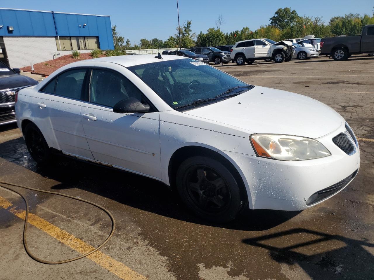 2009 Pontiac G6 VIN 1G2ZG57B694148753 Copart auction photo, rear end damage thumbnail 4