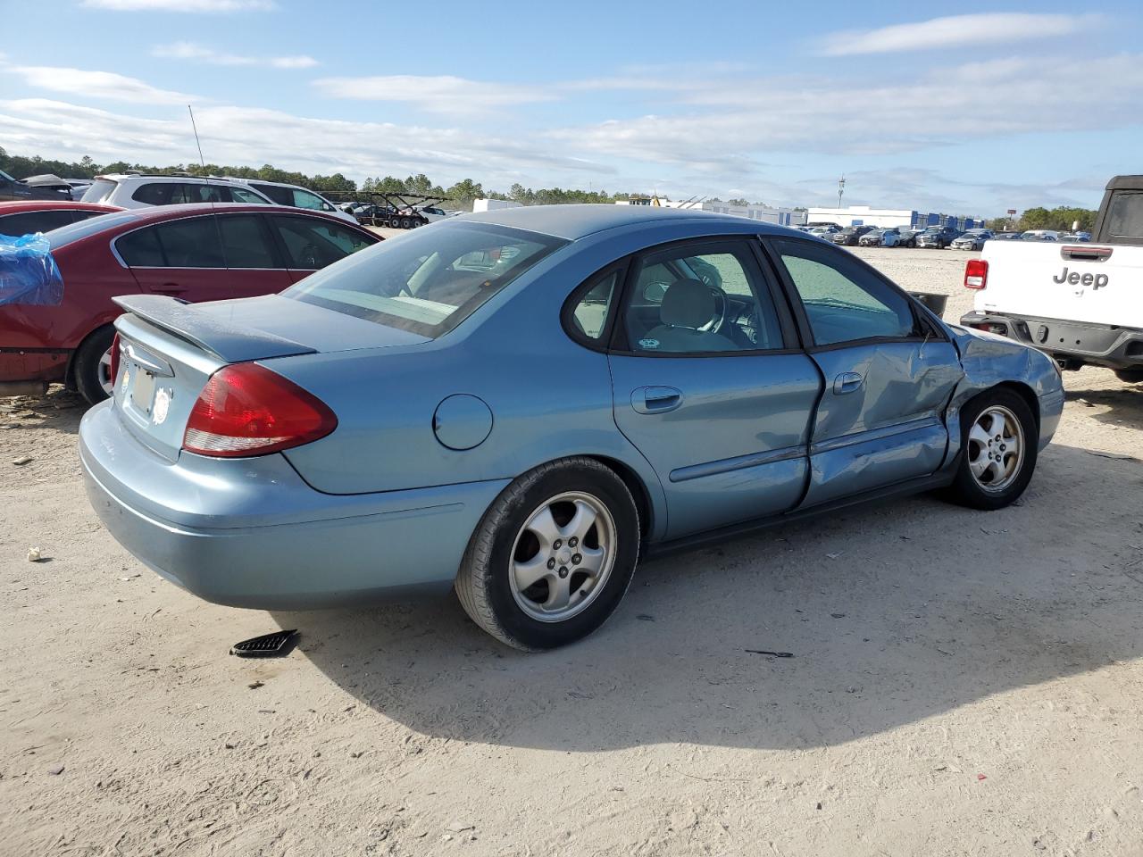 2005 Ford Taurus VIN 1FAFP53215A164333 Copart auction photo, side / front end damage thumbnail 3