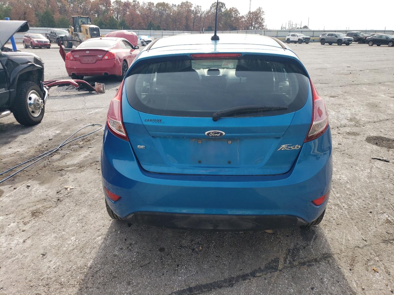 2015 Ford Fiesta VIN 3FADP4EJ6FM160742 Copart auction photo, side damage thumbnail 6