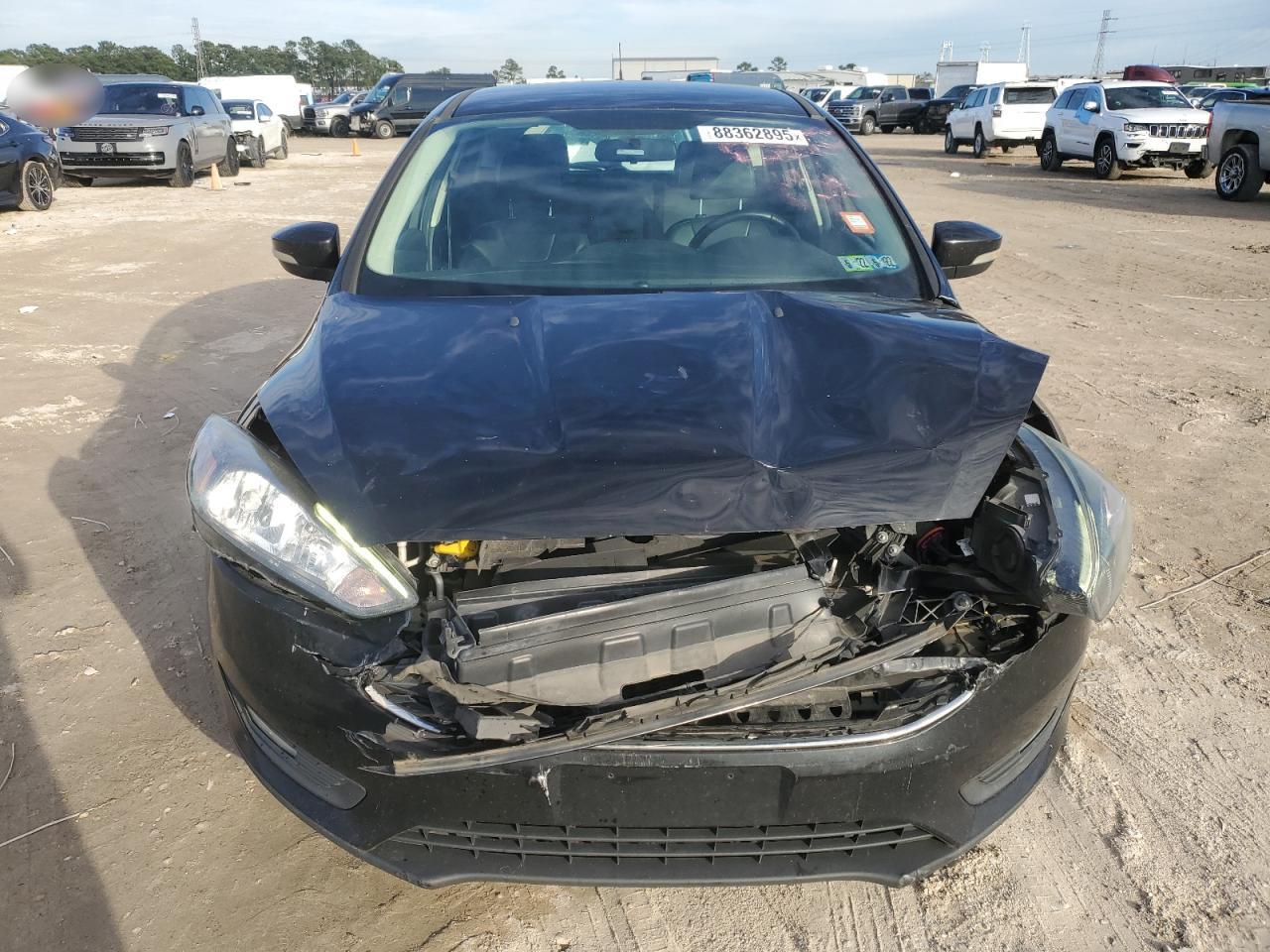 2016 Ford Focus VIN 1FADP3K25GL340031 Copart auction photo, front end damage thumbnail 5