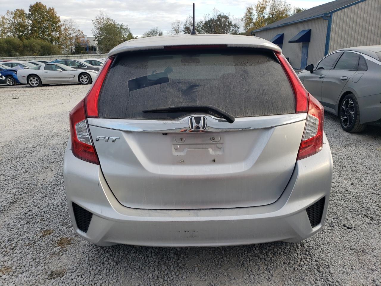 2016 Honda Fit VIN JHMGK5H71GX045407 Copart auction photo, side / front end damage thumbnail 6