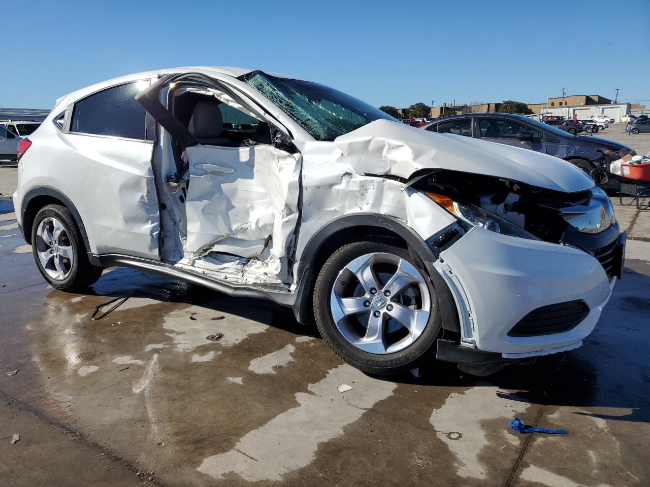 2020 Honda HR-V VIN 3CZRU5H31LM714903 Copart auction photo, side / front end damage thumbnail 4