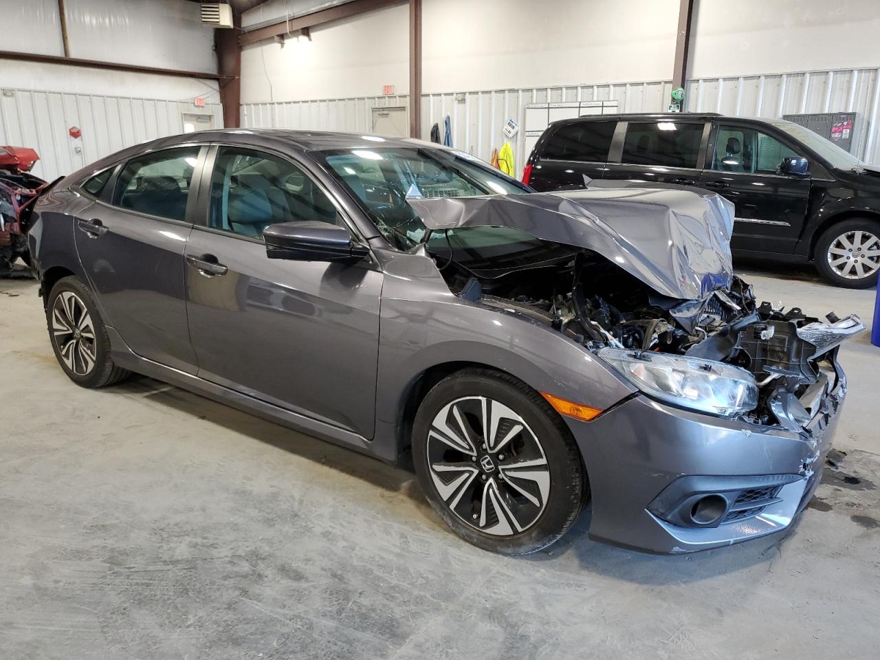 2017 Honda Civic VIN 19XFC1F31HE011407 Copart auction photo, all over damage thumbnail 4