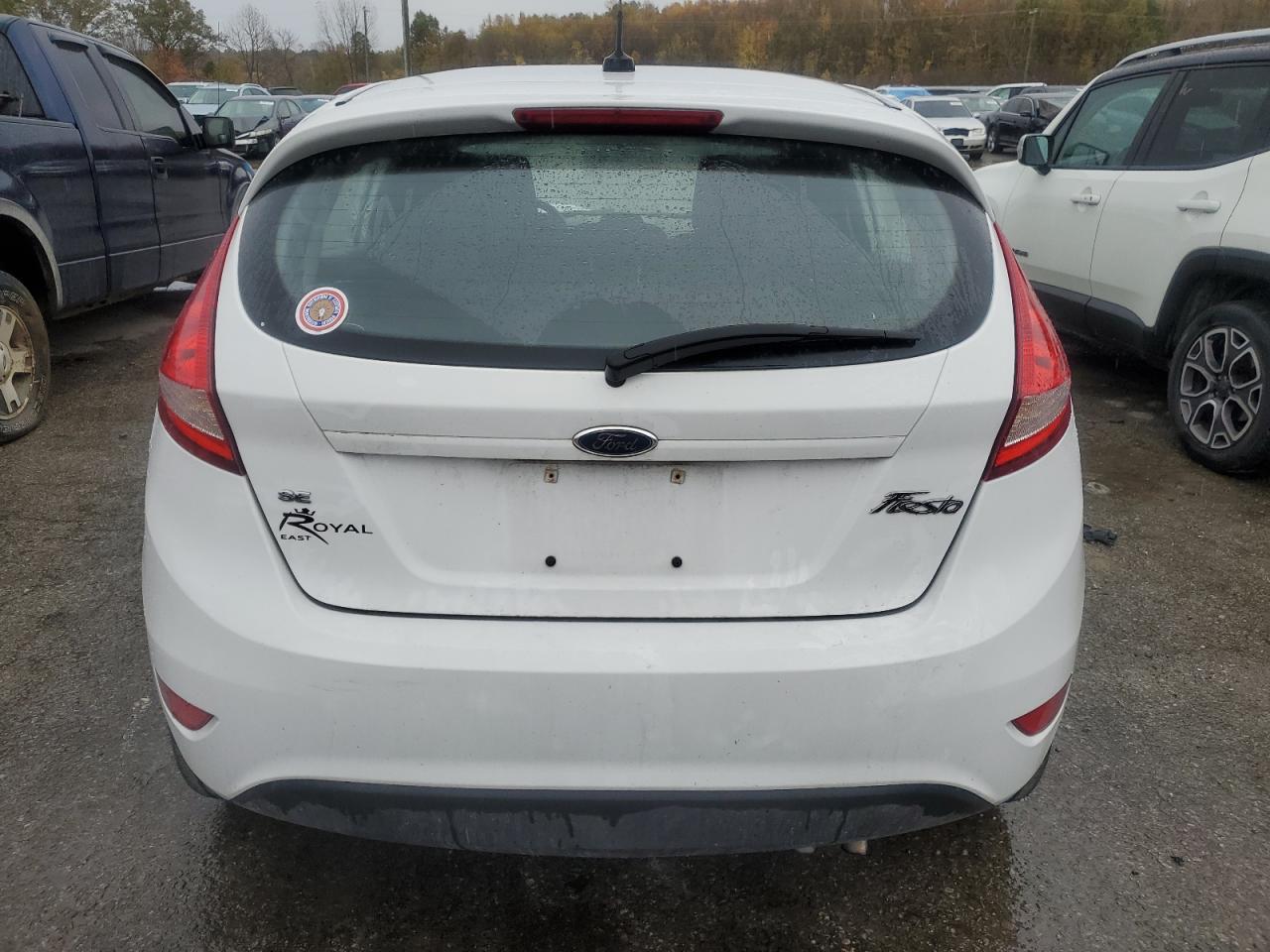 2012 Ford Fiesta VIN 3FADP4EJ2CM125952 Copart auction photo, front end / side damage thumbnail 6
