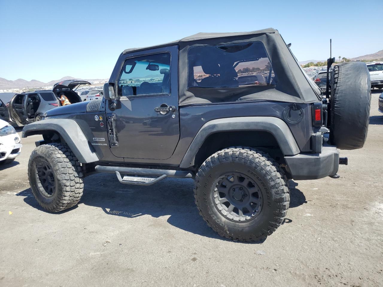 2014 Jeep Wrangler VIN 1C4AJWAG4EL244983 Copart auction photo, side / front end damage thumbnail 2