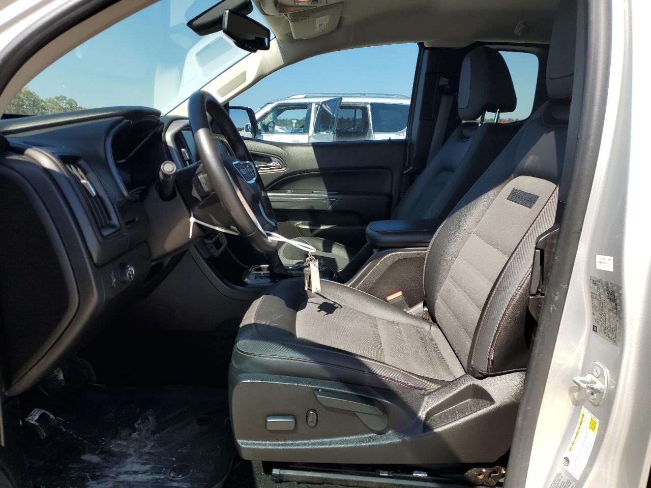 2016 GMC Canyon VIN 1GTH5CE34G1386158 Copart auction photo, rear end / minor dent/scratches damage thumbnail 7