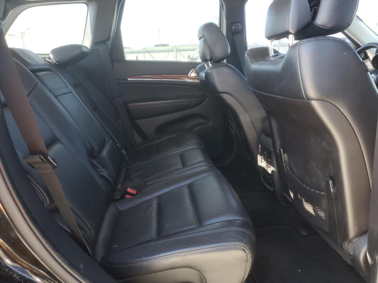 2012 Jeep Grand Cherokee VIN 1C4RJFBTXCC185319 Copart auction photo, rear end damage thumbnail 11