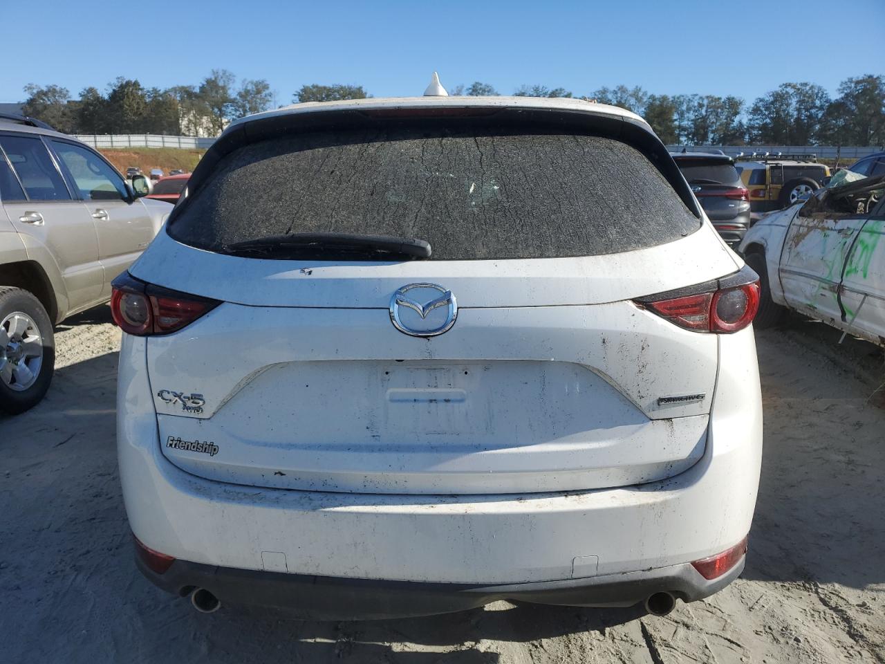 2021 Mazda CX-5 VIN JM3KFBDM6M1390237 Copart auction photo, top/roof damage thumbnail 6