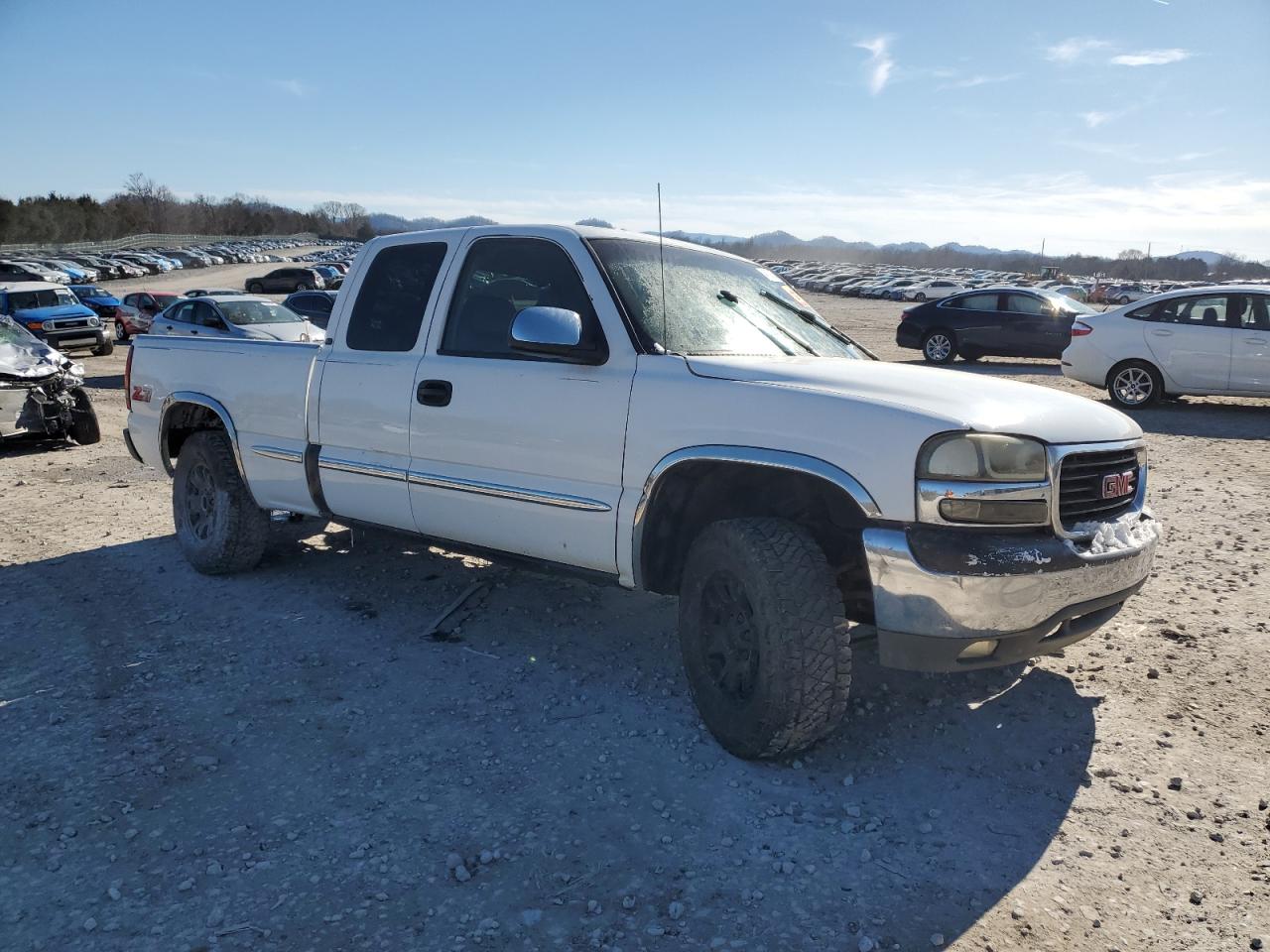 1999 GMC Sierra VIN 1GTEK19T9XZ514986 Copart auction photo, all over damage thumbnail 4