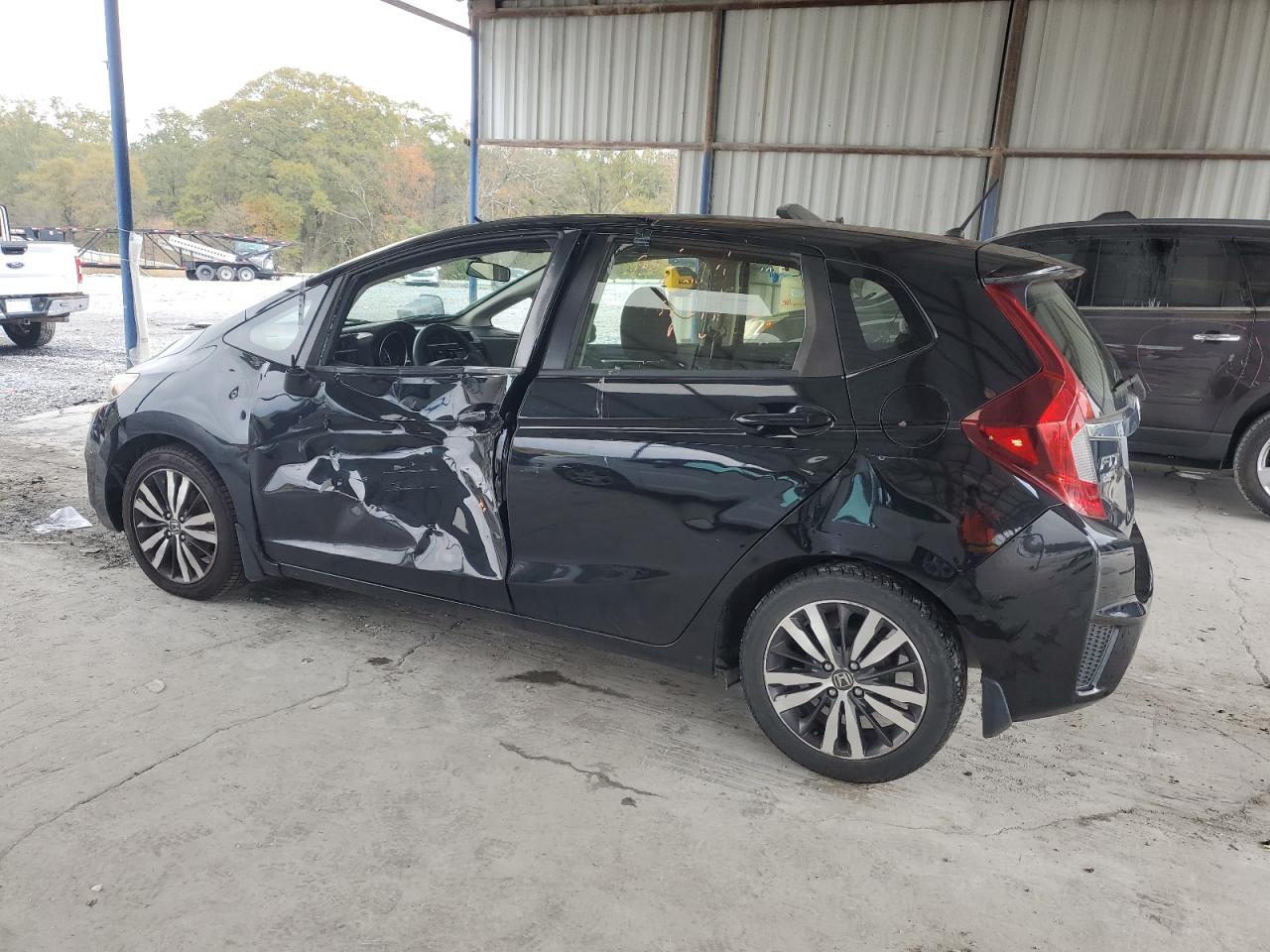 2016 Honda Fit VIN JHMGK5H77GX001346 Copart auction photo, side / front end damage thumbnail 2