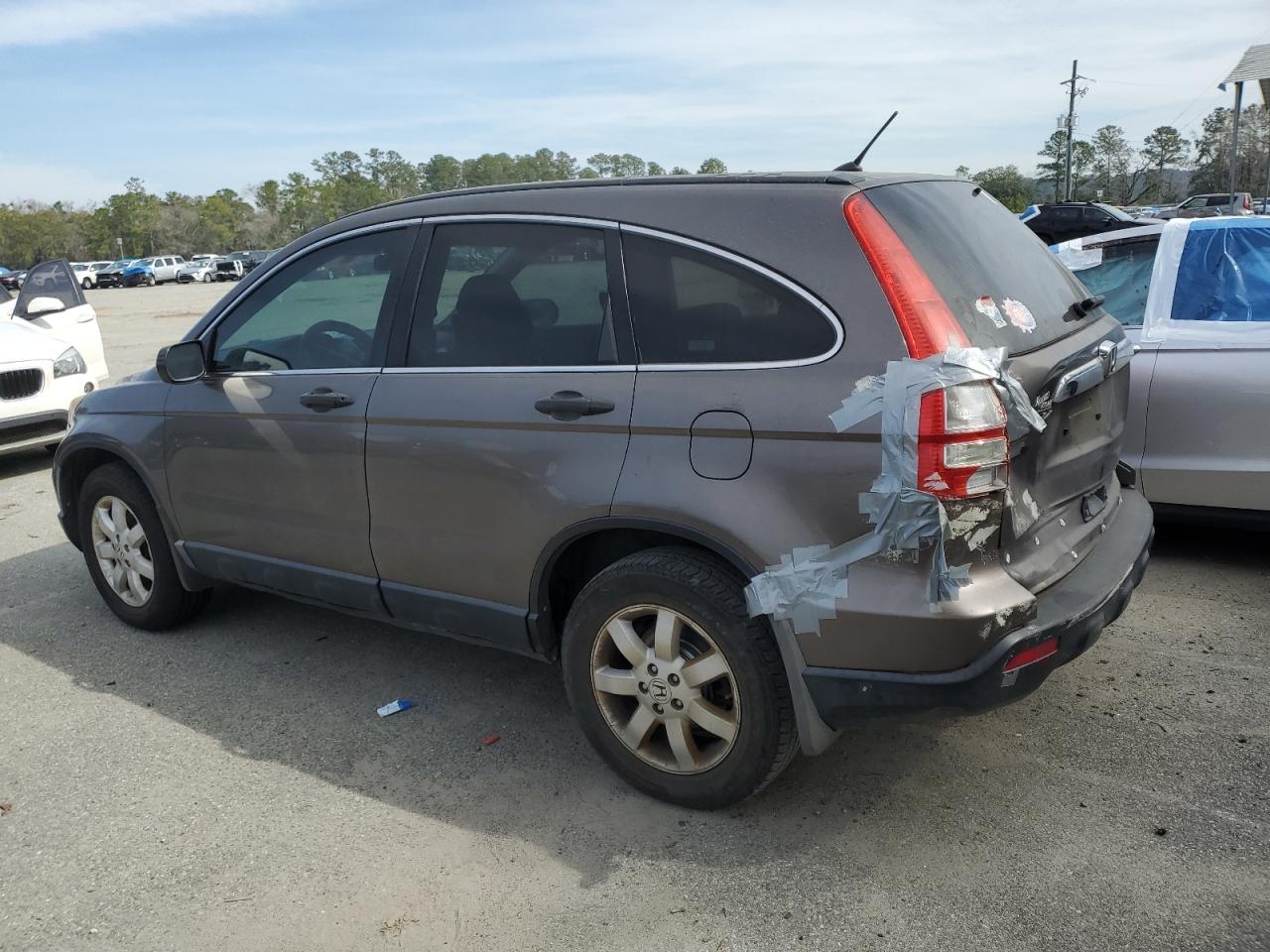 2009 Honda CR-V VIN 3CZRE38569G703504 Copart auction photo, rear end damage thumbnail 2