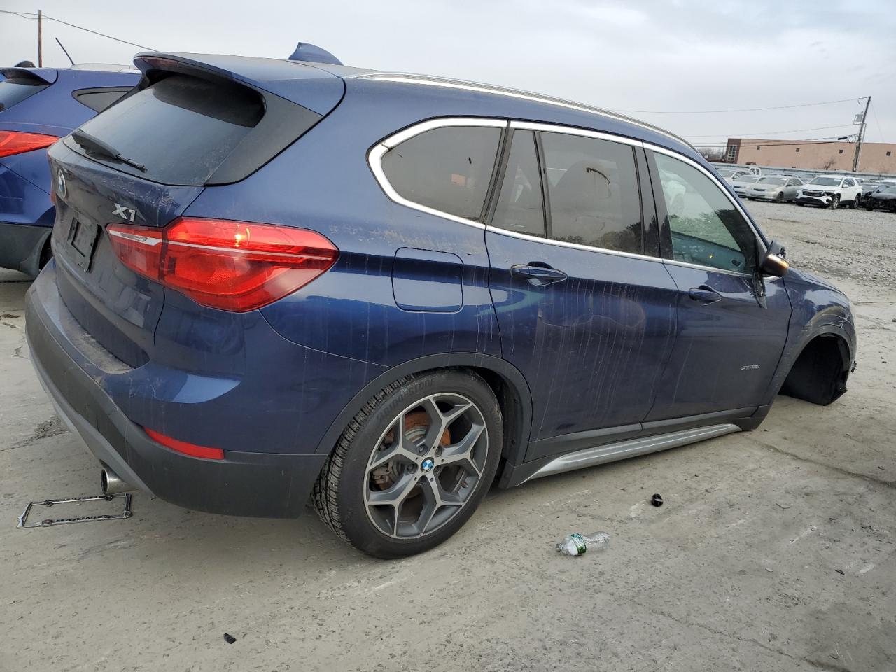 2016 BMW X1 VIN WBXHT3C34G5F64268 Copart auction photo, undercarriage / front end damage thumbnail 3