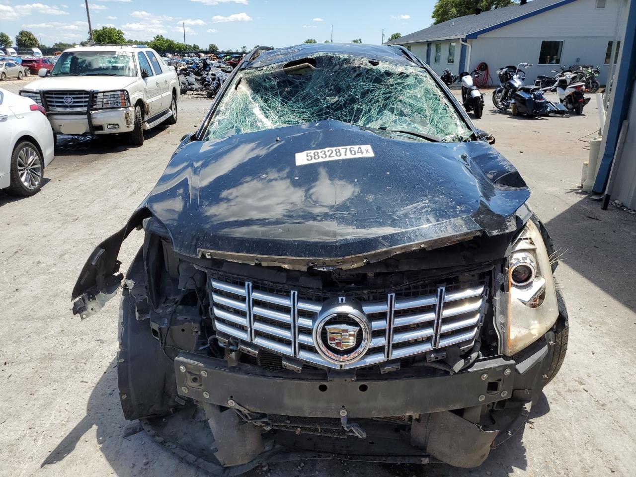 2013 Cadillac SRX VIN 3GYFNAE30DS639301 Copart auction photo, all over damage thumbnail 5