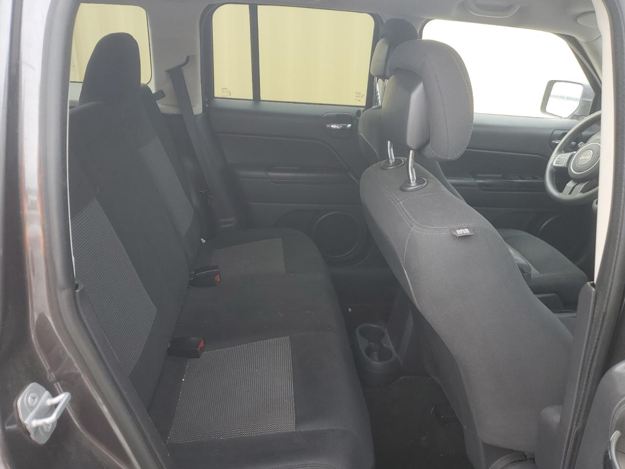 2015 Jeep Liberty (Patriot) VIN 1C4NJPBA9FD102819 Copart auction photo, front end / undercarriage damage thumbnail 11