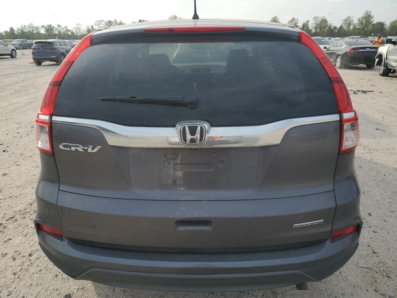 2016 Honda CR-V VIN 2HKRM3H4XGH562330 Copart auction photo, front end / minor dent/scratches damage thumbnail 6