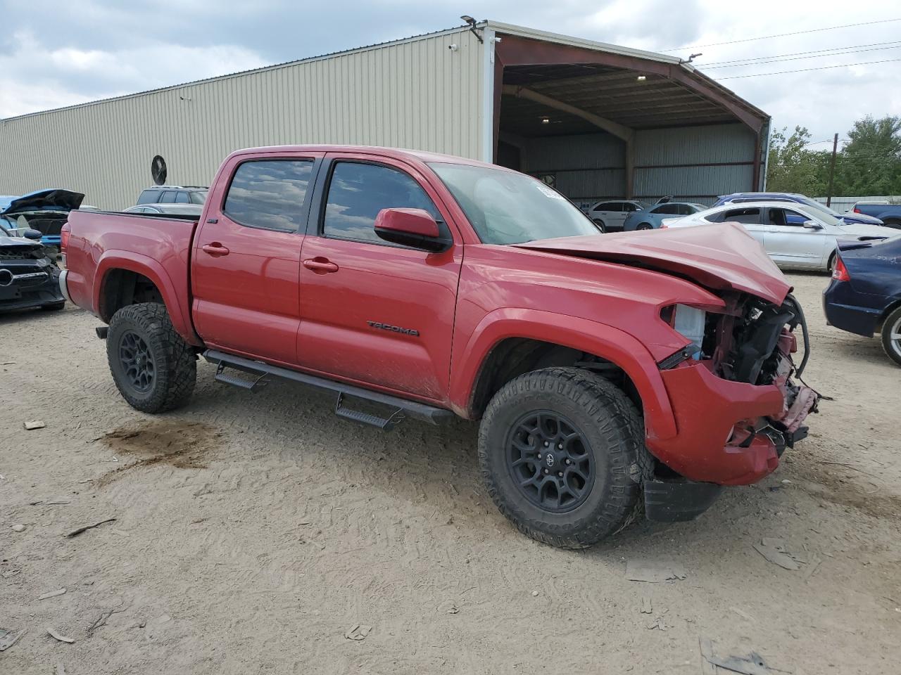 2021 Toyota Tacoma VIN 5TFAZ5CN8MX113528 Copart auction photo, front end / side damage thumbnail 4