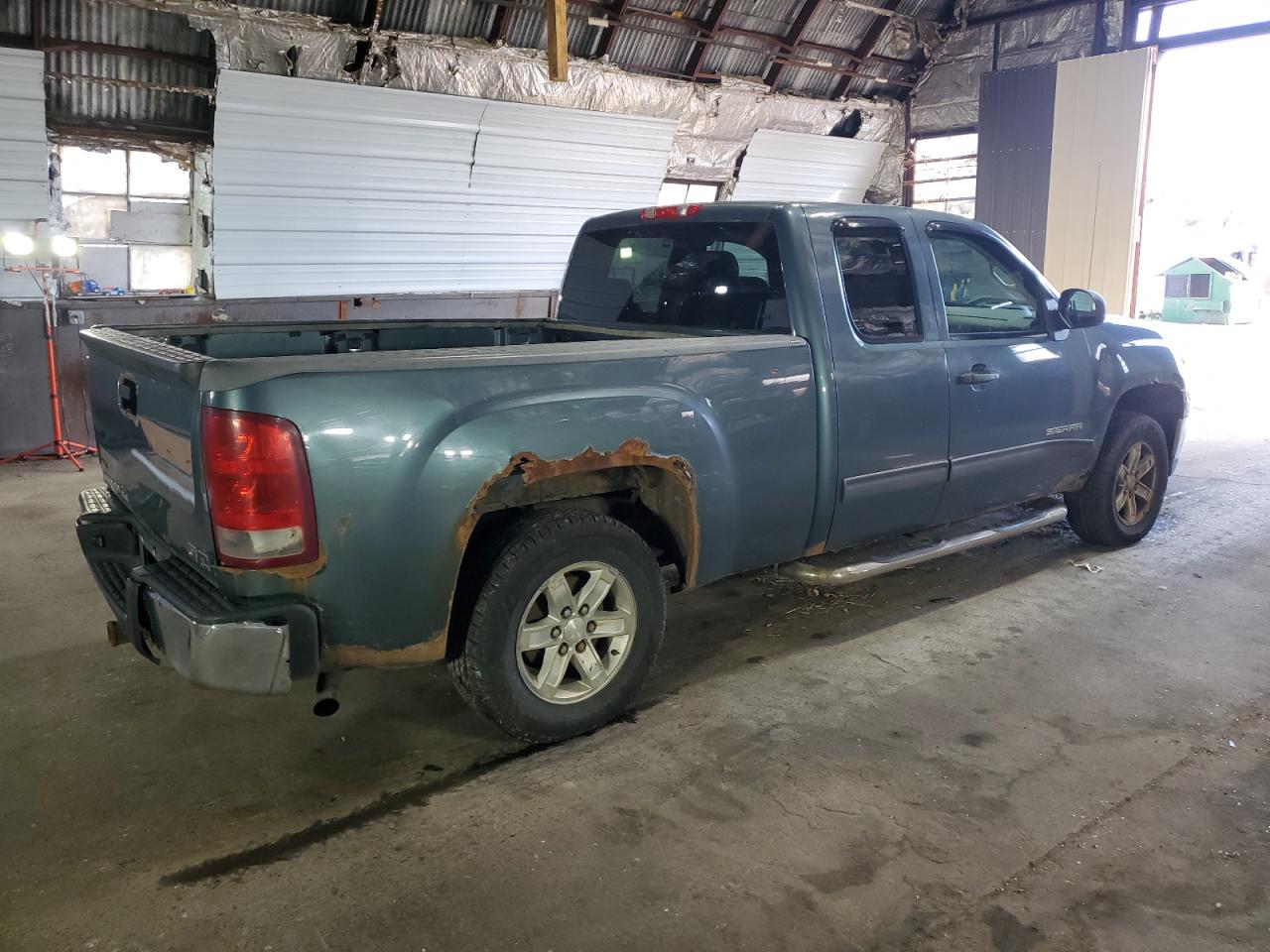 2011 GMC Sierra VIN 1GTR1VE03BZ338694 Copart auction photo, undercarriage / normal wear damage thumbnail 3