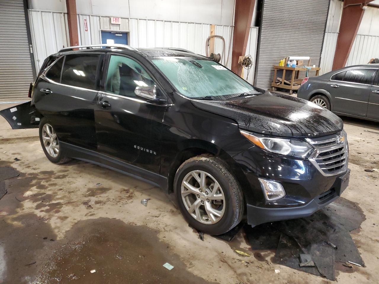 2018 Chevrolet Equinox VIN 2GNAXMEV9J6147932 Copart auction photo, rear end damage thumbnail 4