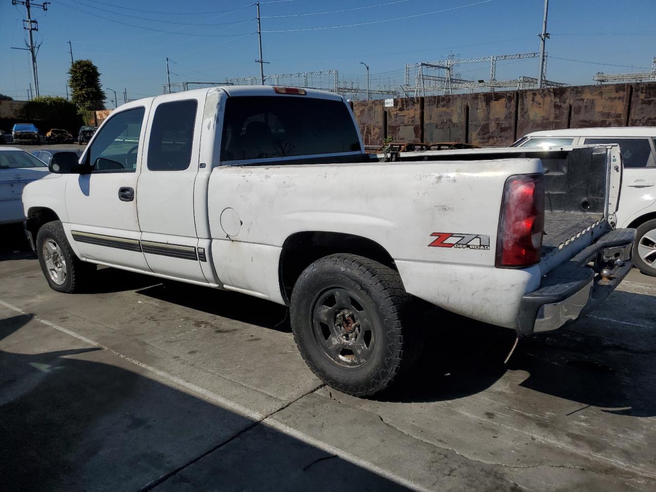 2001 Chevrolet Silverado VIN 1GCEK19T01E219547 Copart auction photo, vandalism / rear end damage thumbnail 2