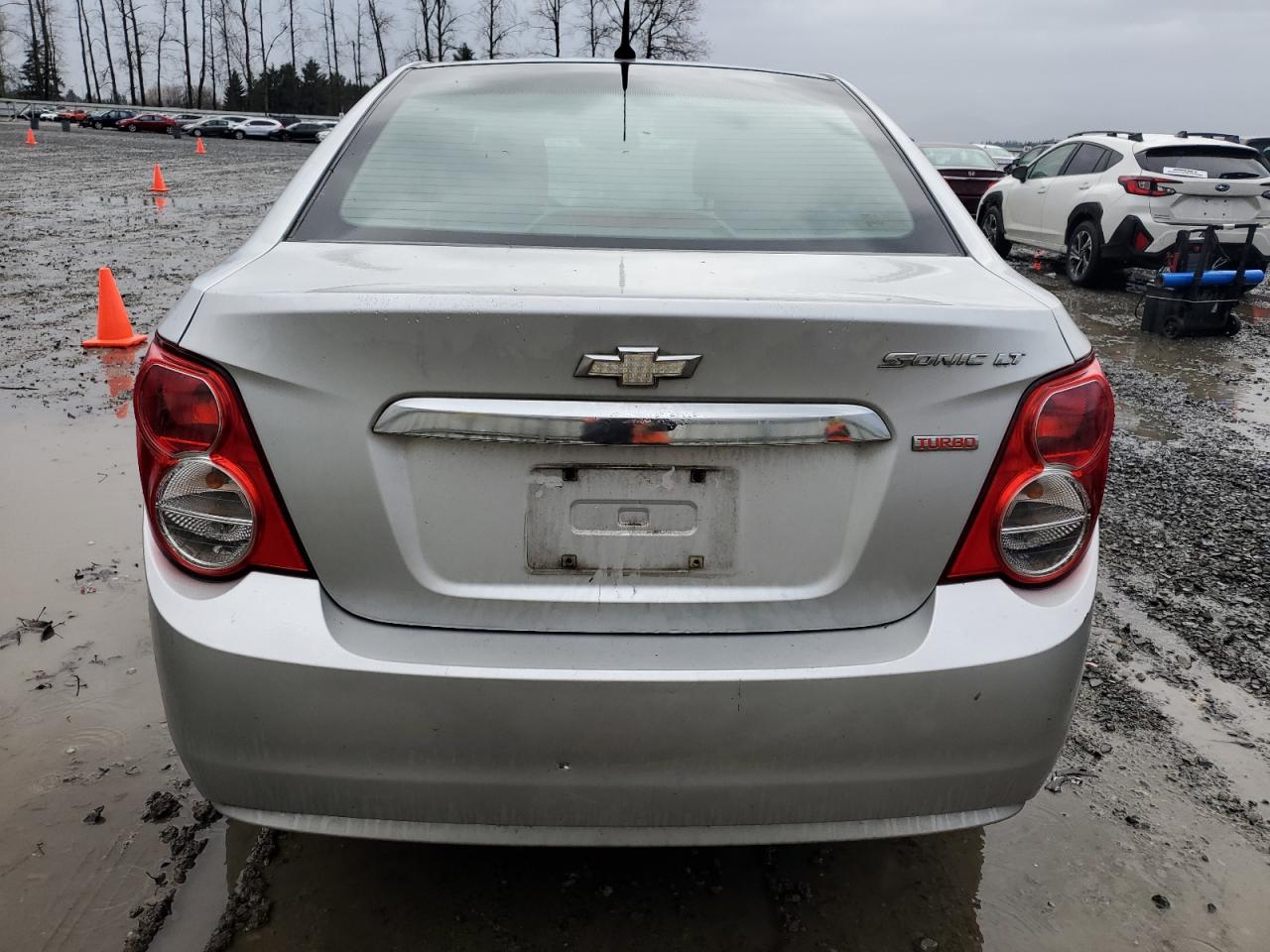 2012 Chevrolet Sonic VIN 1G1JD5SB1C4121811 Copart auction photo, front end / rear end damage thumbnail 6