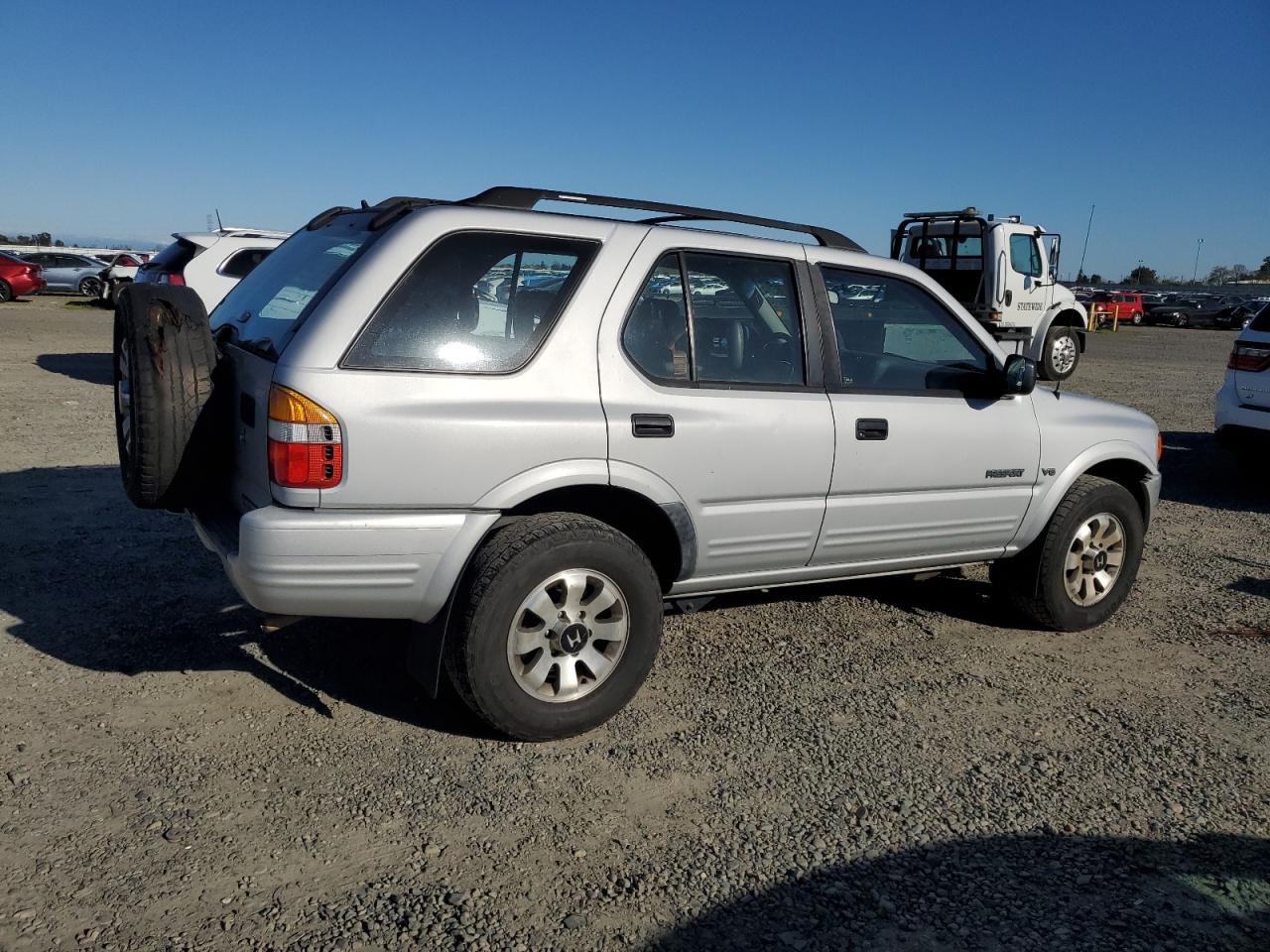 1999 Honda Passport VIN 4S6CM58W1X4411839 Copart auction photo, rear end damage thumbnail 3
