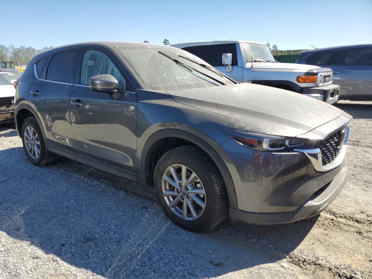 2022 Mazda CX-5 VIN JM3KFBCM8N1607211 Copart auction photo, water/flood damage thumbnail 4