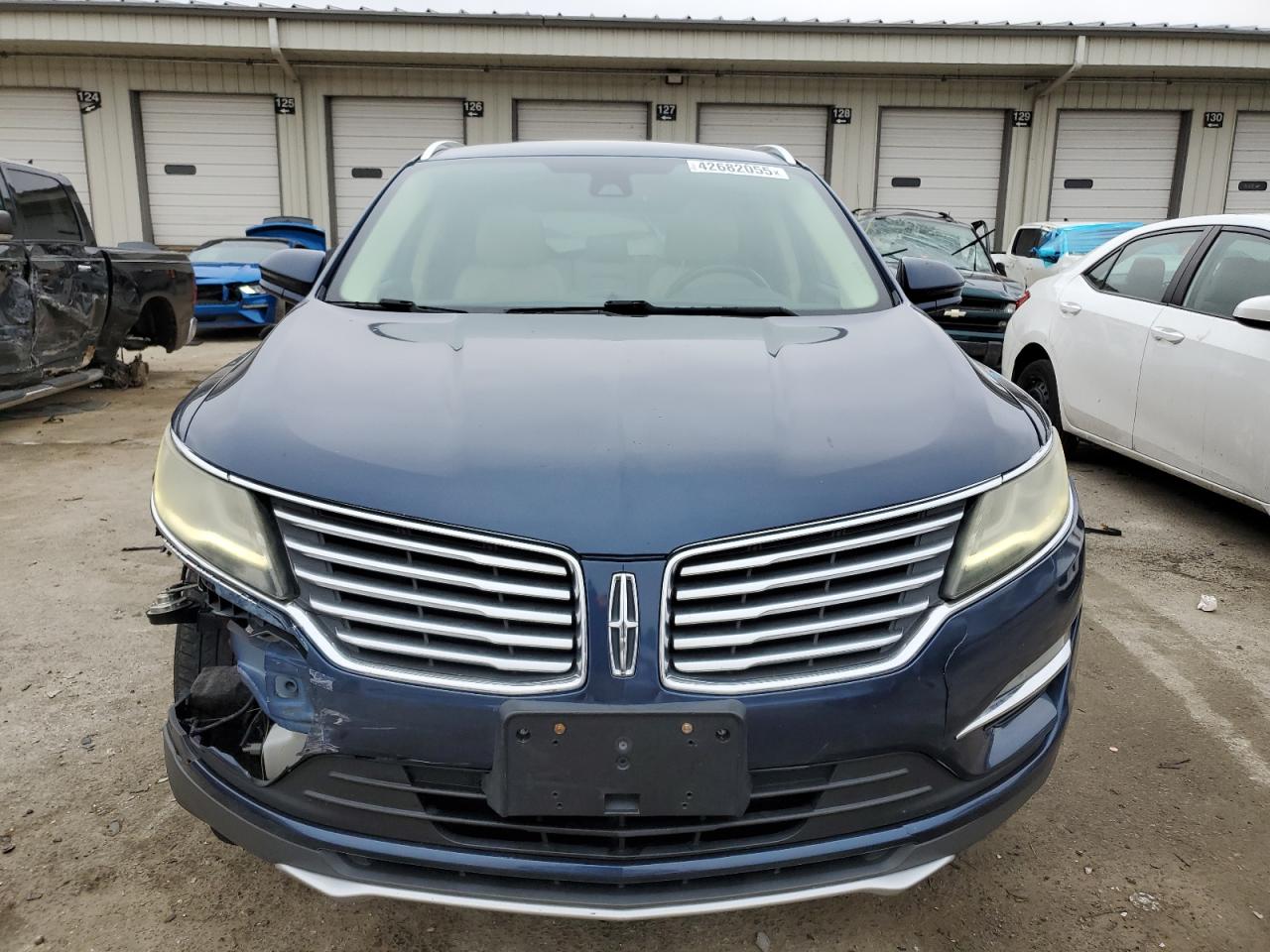 2015 Lincoln MKZ VIN 5LMCJ2A97FUJ24439 Copart auction photo, front end damage thumbnail 5