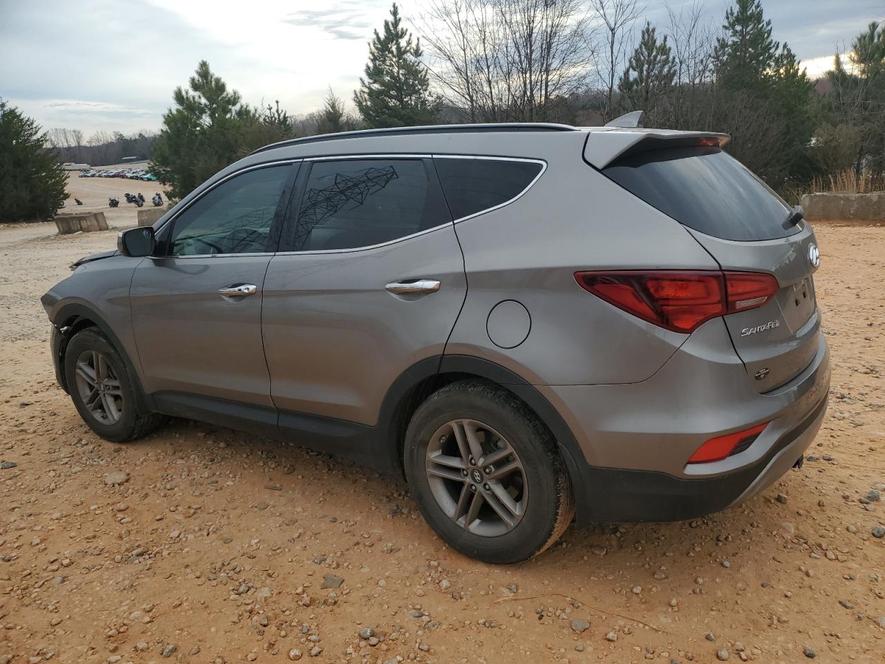 2017 Hyundai Santa Fe VIN 5NMZU3LB1HH027651 Copart auction photo, front end damage thumbnail 2