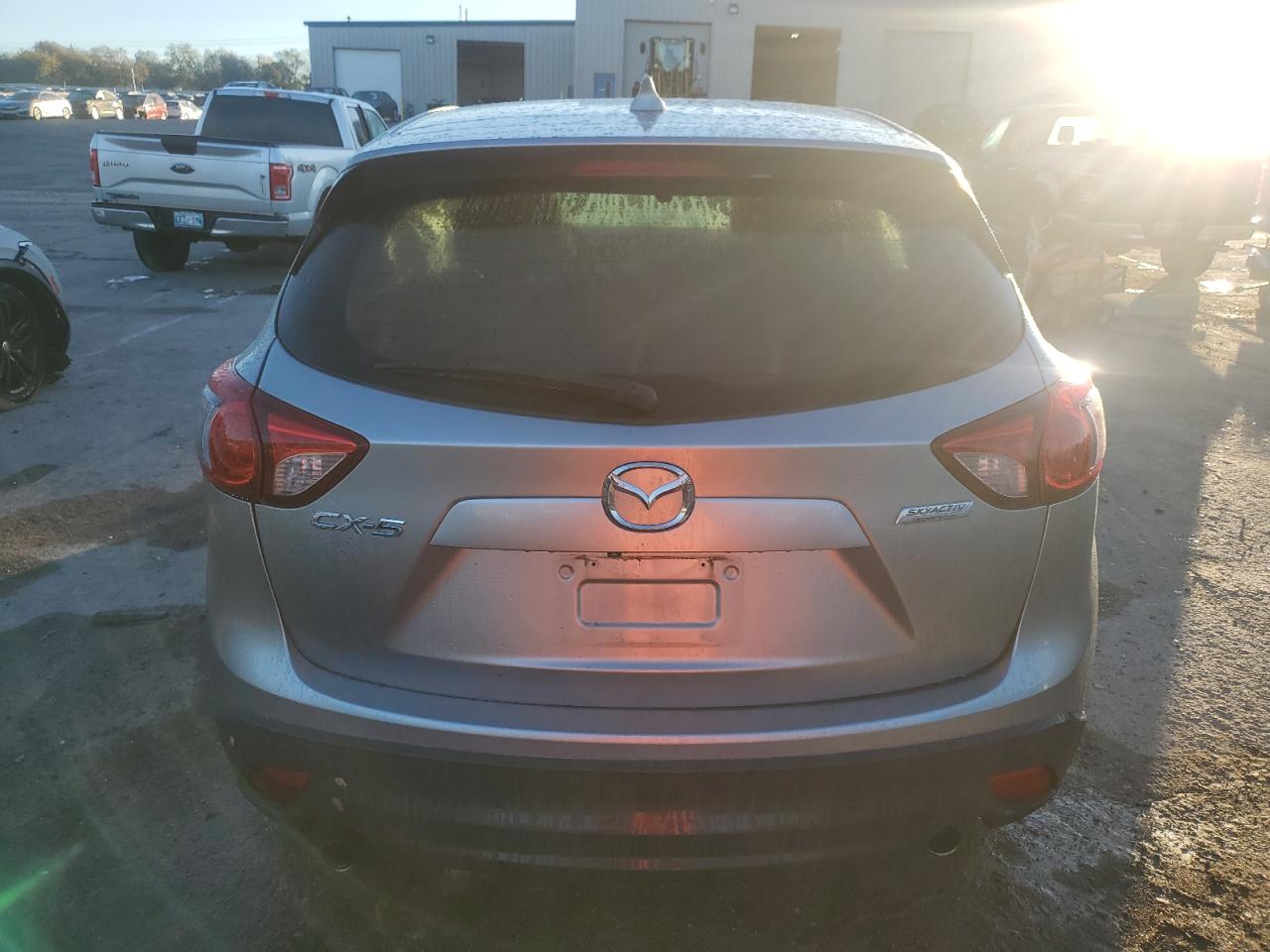 2015 Mazda CX-5 VIN JM3KE2CY2F0436422 Copart auction photo, side / rear end damage thumbnail 6