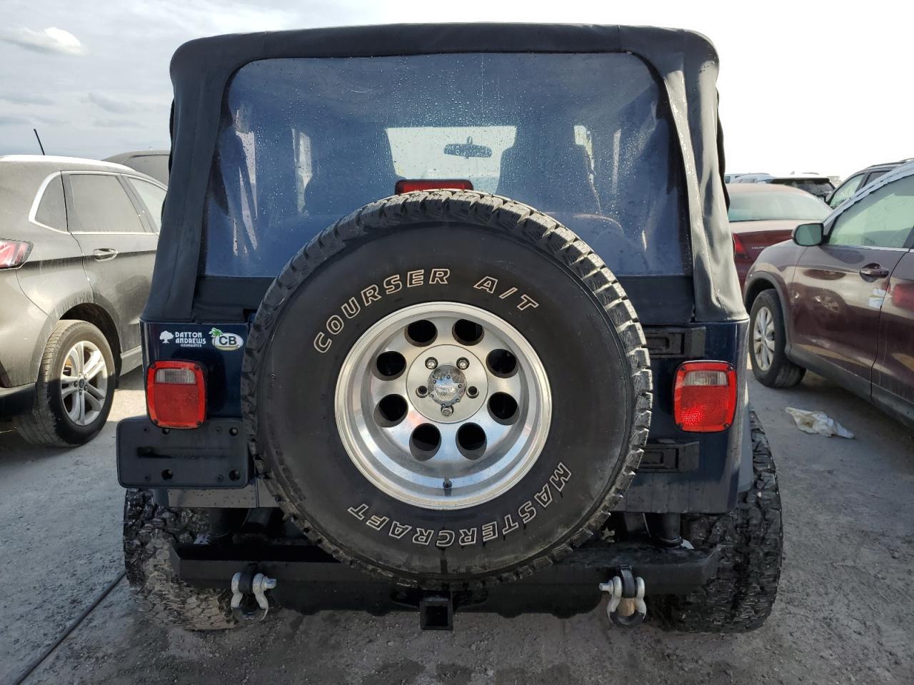 2004 Jeep Wrangler VIN 1J4FA39S14P775346 Copart auction photo, water/flood damage thumbnail 6
