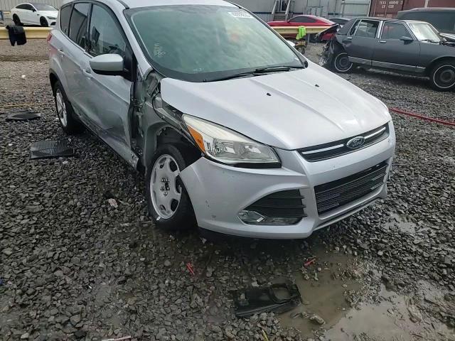 2014 Ford Escape VIN 1FMCU0GX6EUA69226 Copart auction photo, side / minor dent/scratches damage thumbnail 14