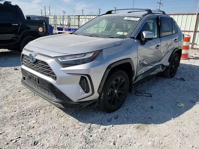 2023 Toyota RAV 4 VIN JTM16RFV1PD079708 Copart auction photo, side / mechanical damage thumbnail 11