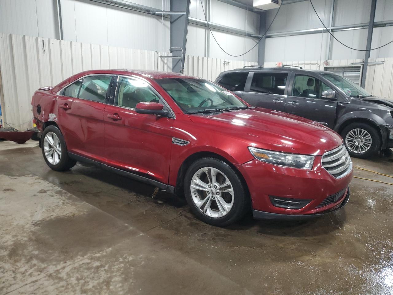 2015 Ford Taurus VIN 1FAHP2H81FG208284 Copart auction photo, rollover damage thumbnail 4