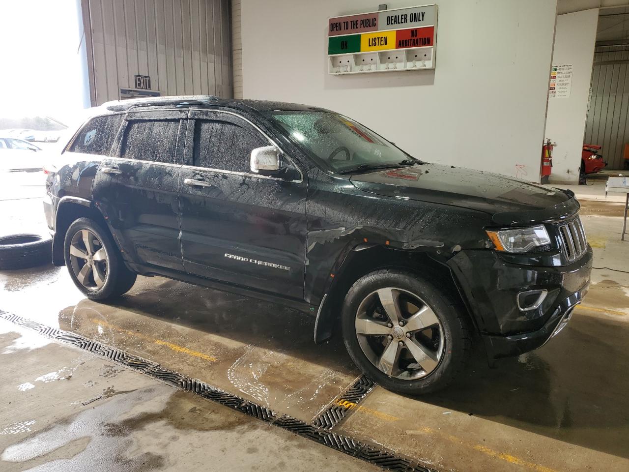 2015 Jeep Grand Cherokee VIN 1C4RJFCG5FC813003 Copart auction photo, side / minor dent/scratches damage thumbnail 4