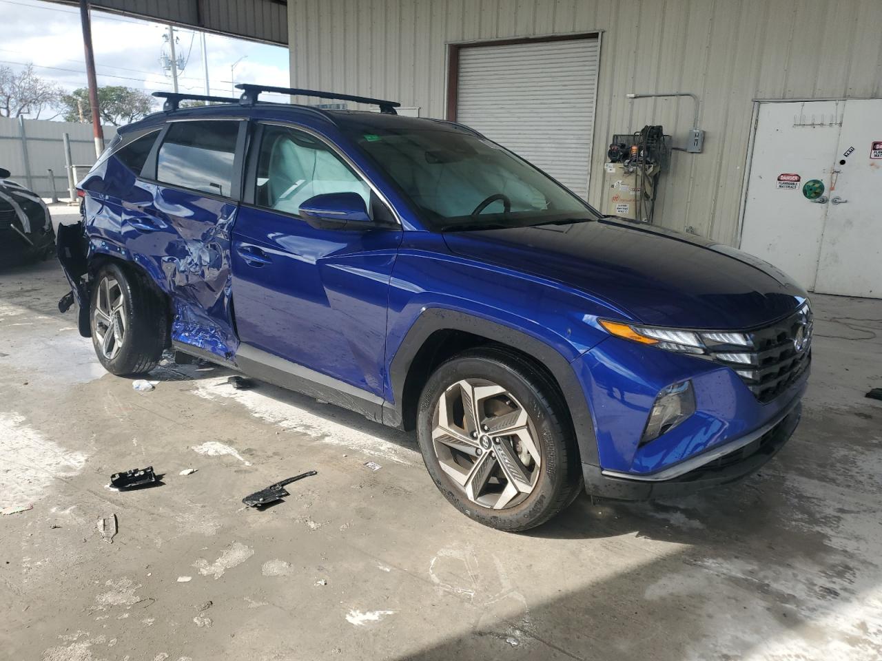 2023 Hyundai Tucson VIN 5NMJF3AE8PH208393 Copart auction photo, all over damage thumbnail 4