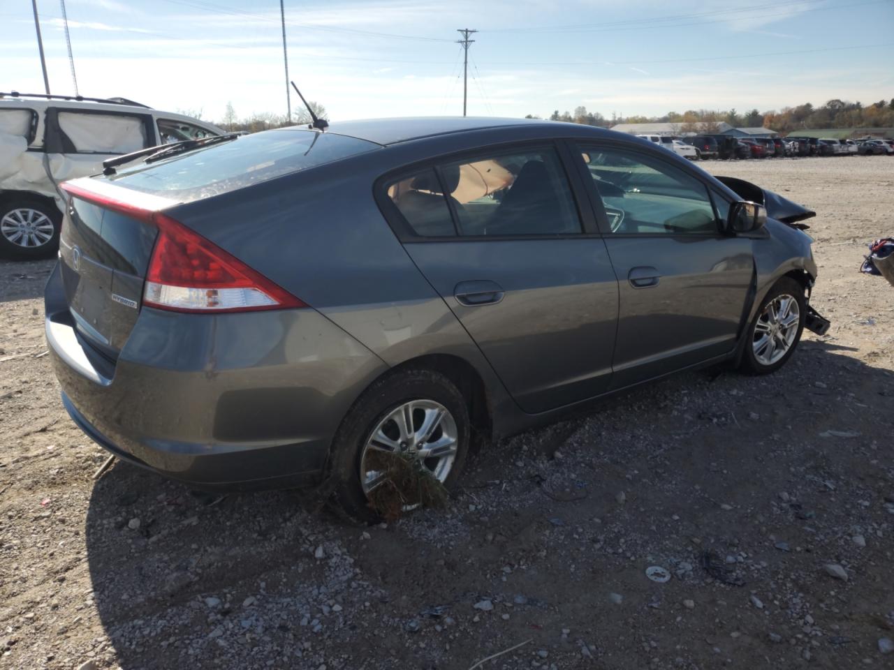 2010 Honda Insight VIN JHMZE2H79AS035033 Copart auction photo, front end / rear end damage thumbnail 3
