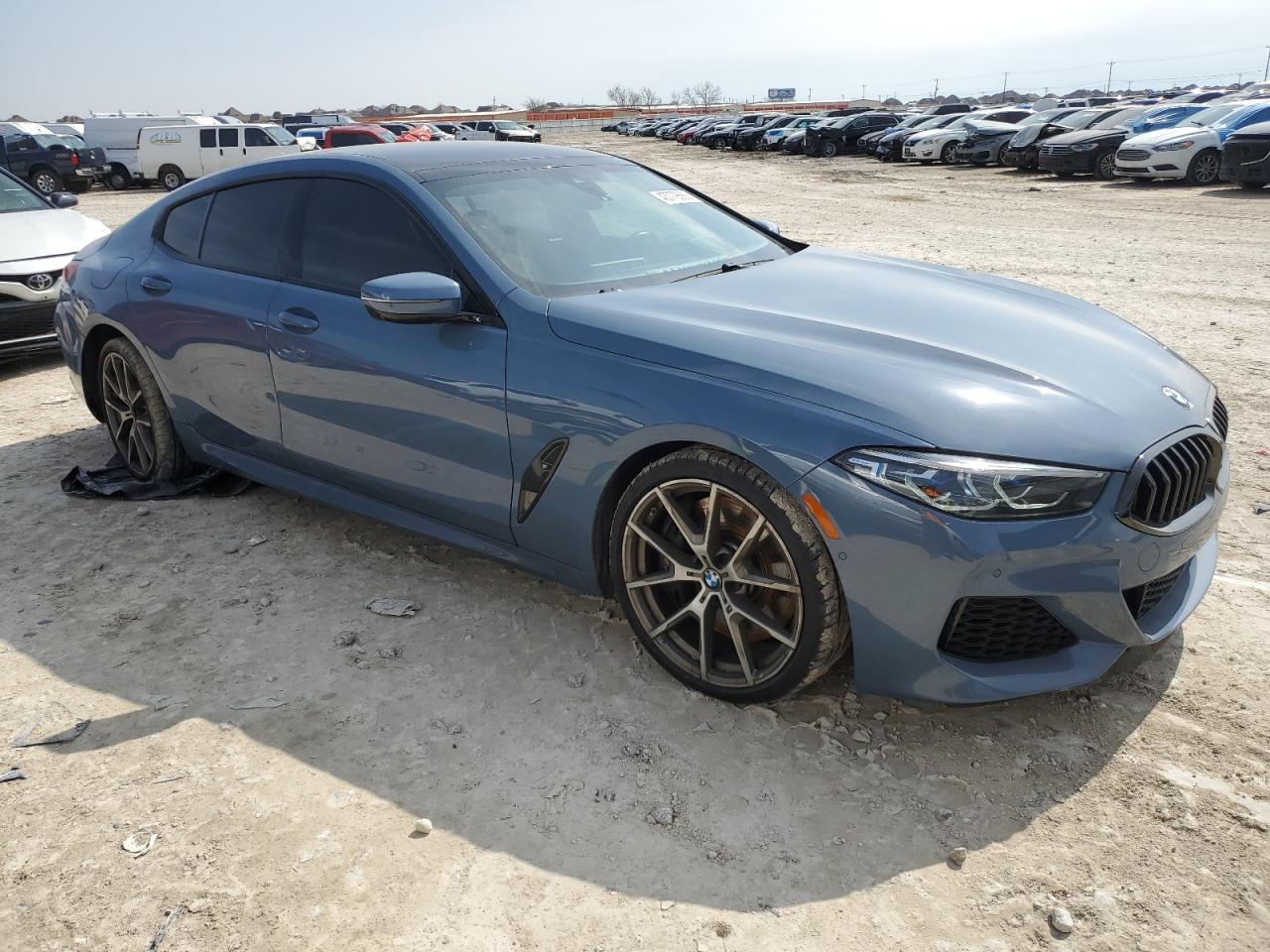 2022 BMW M8 VIN WBAGV8C06NCH98097 Copart auction photo, rear end / side damage thumbnail 4