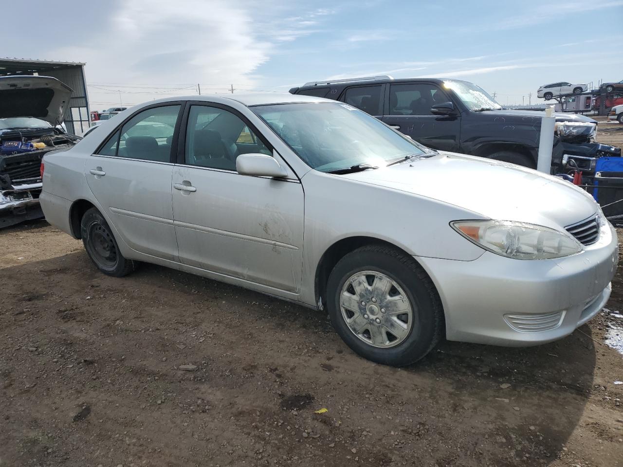 2006 Toyota Camry VIN 4T1BE32K06U165943 Copart auction photo, side / rear end damage thumbnail 4