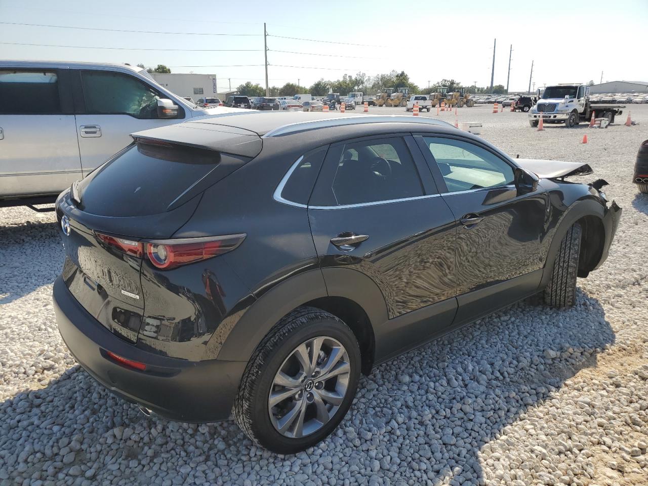 2024 Mazda CX-30 VIN 3MVDMBCM4RM714092 Copart auction photo, front end / minor dent/scratches damage thumbnail 3