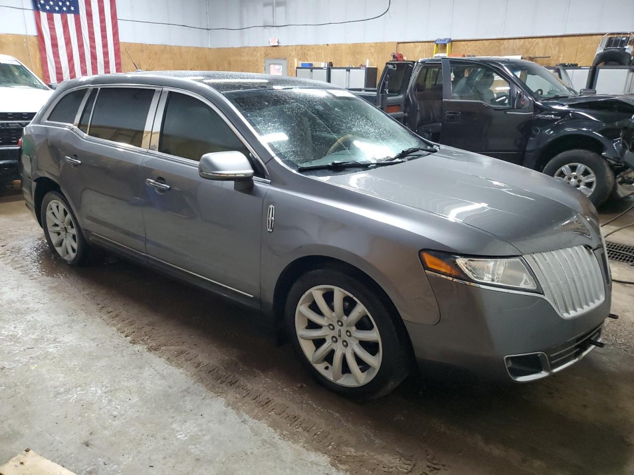 2010 Lincoln MKT VIN 2LMHJ5AR5ABJ08639 Copart auction photo, front end / rear end damage thumbnail 4