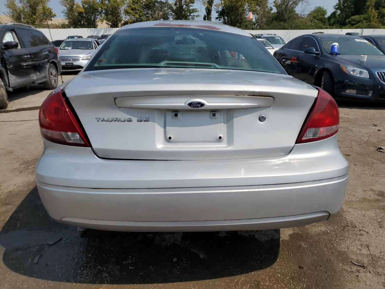 2007 Ford Taurus VIN 1FAFP53U17A179774 Copart auction photo, all over damage thumbnail 6