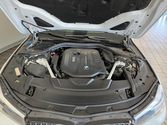 2018 BMW 7er VIN WBA7E2C50JG743251 Copart auction photo, minor dent/scratches / normal wear damage thumbnail 7