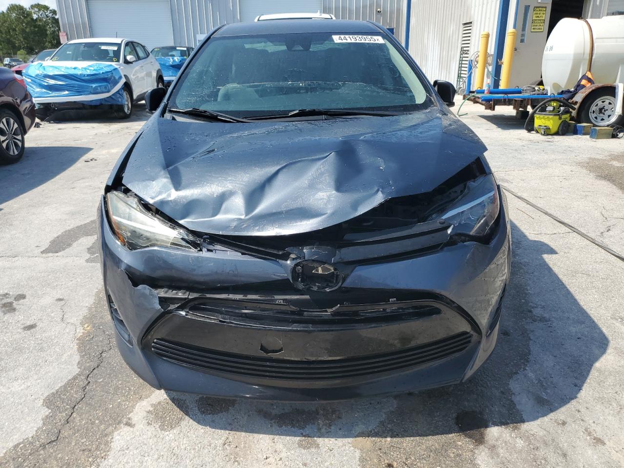 2018 Toyota Corolla VIN 5YFBURHE6JP847601 Copart auction photo, rear end / hail damage thumbnail 5