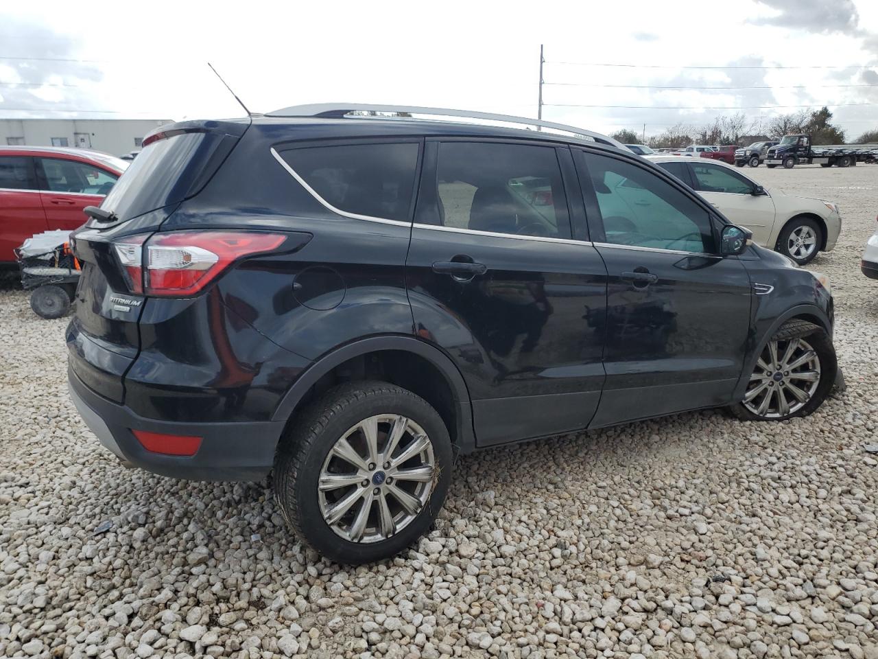 2017 Ford Escape VIN 1FMCU0JD1HUD93140 Copart auction photo, all over damage thumbnail 3