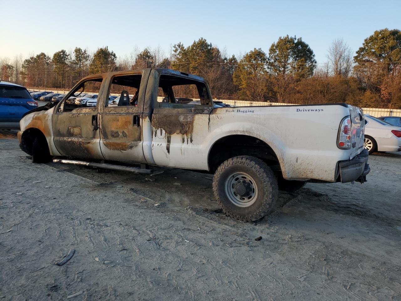 2004 Ford F350 VIN 1FTSW31L54ED09747 Copart auction photo, burn damage thumbnail 2