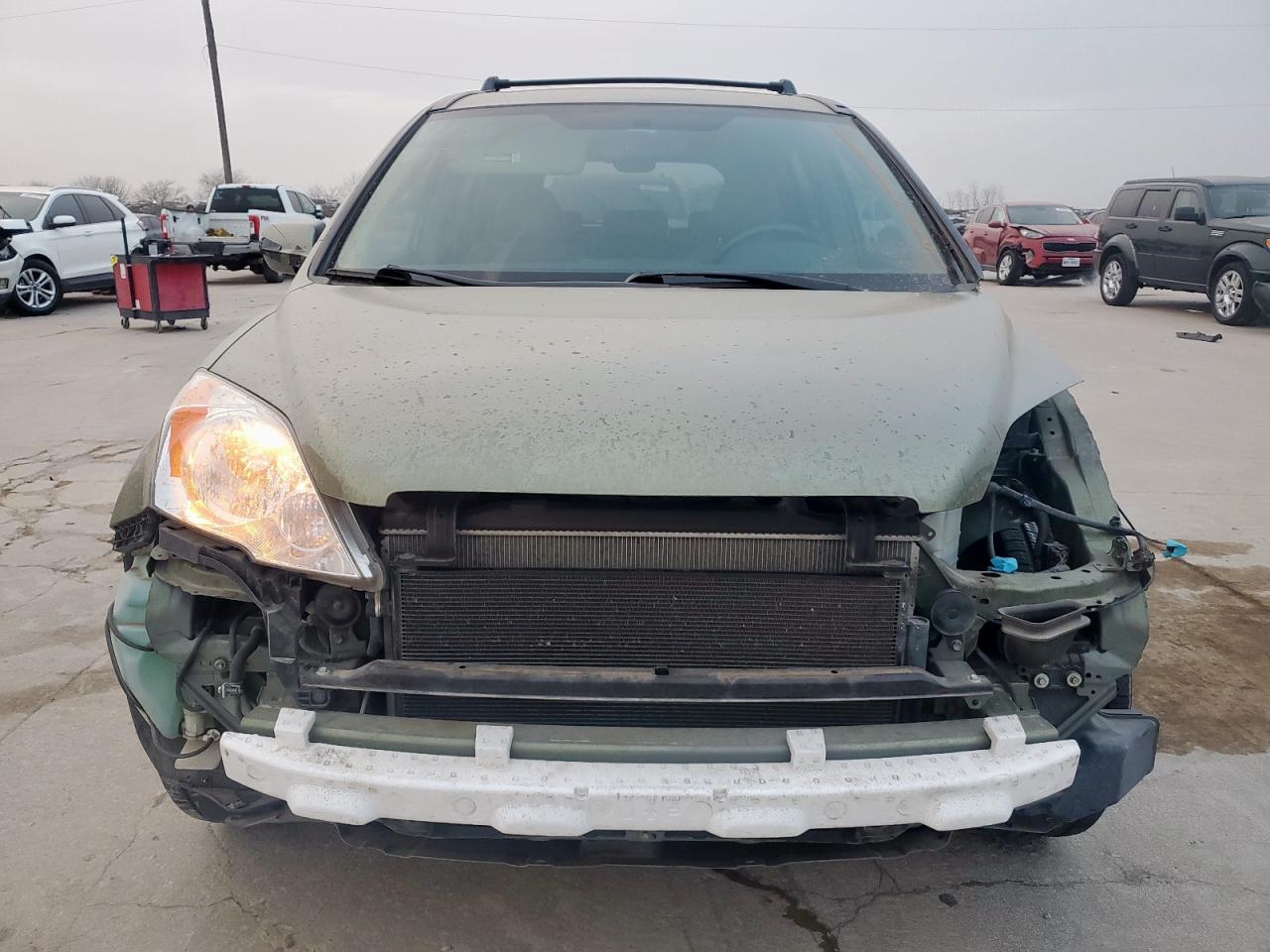 2009 Honda CR-V VIN JHLRE38769C013295 Copart auction photo, front end / stripped damage thumbnail 5