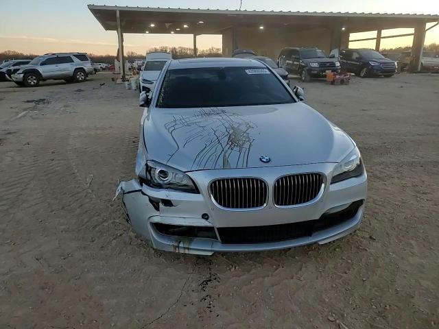 2012 BMW 7er VIN WBAKB4C50CC576043 Copart auction photo, front end / side damage thumbnail 13